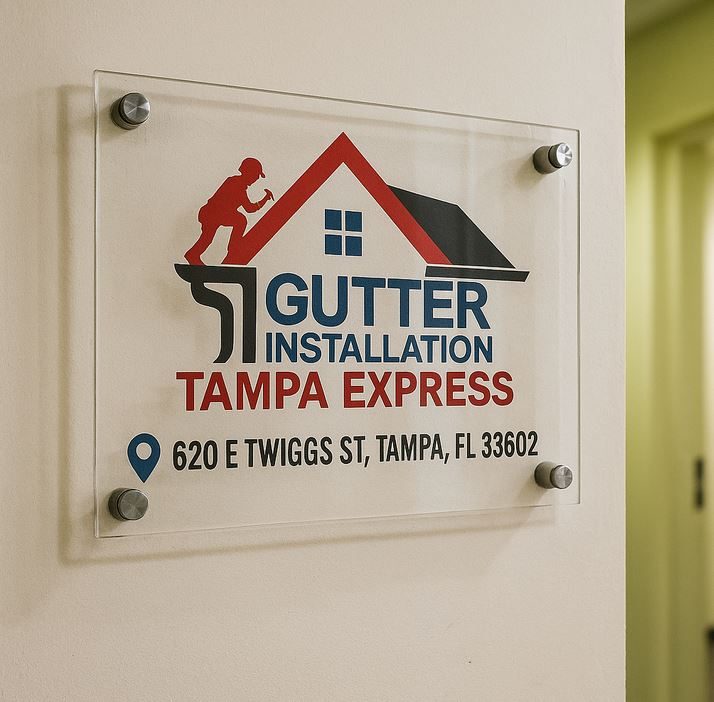 Gutter Installation Tampa Express wall sign showing the address 620 E Twiggs St, Tampa, FL 33602